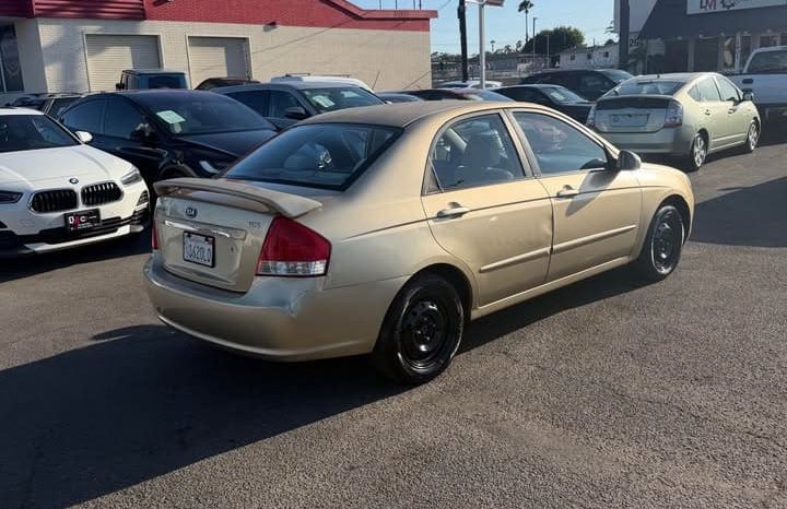 
								2009 Kia spectra full									